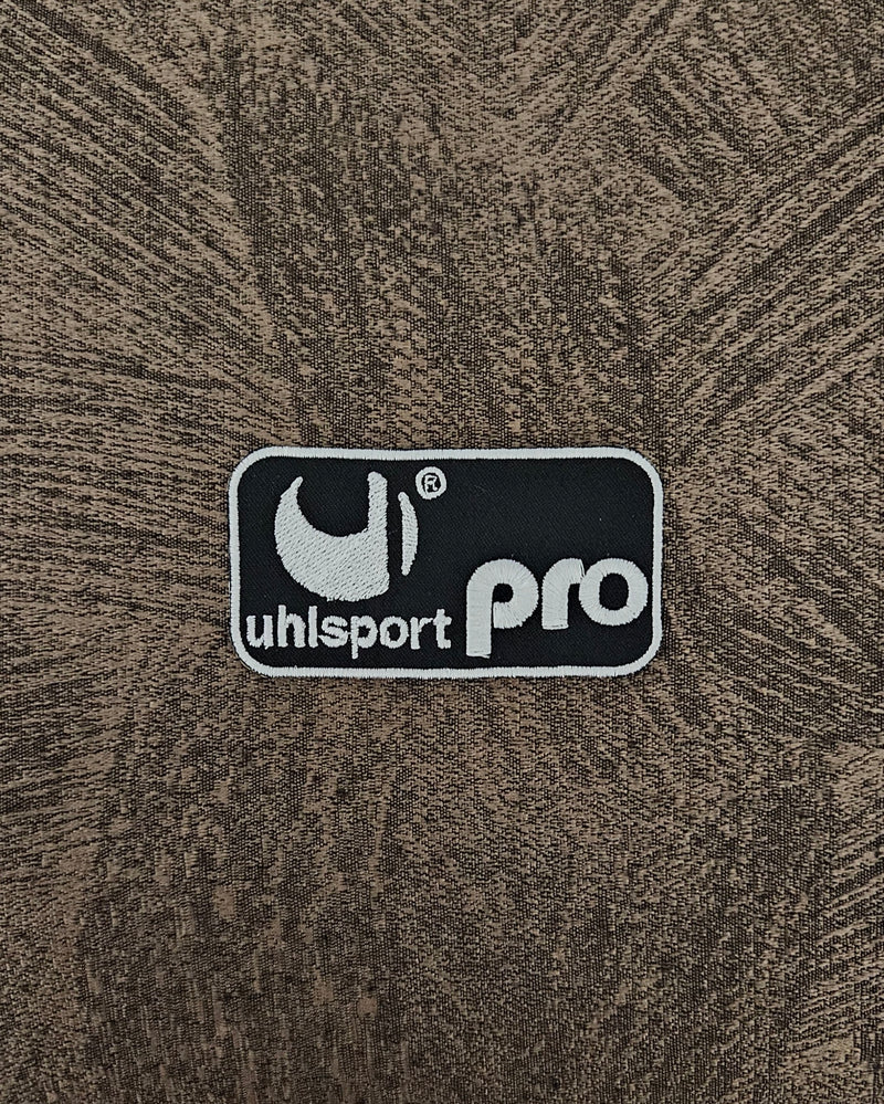 Patch Toppa Ricamata Uhlsport Pro Termoadesiva o da Cucire Diametro 9x5cm