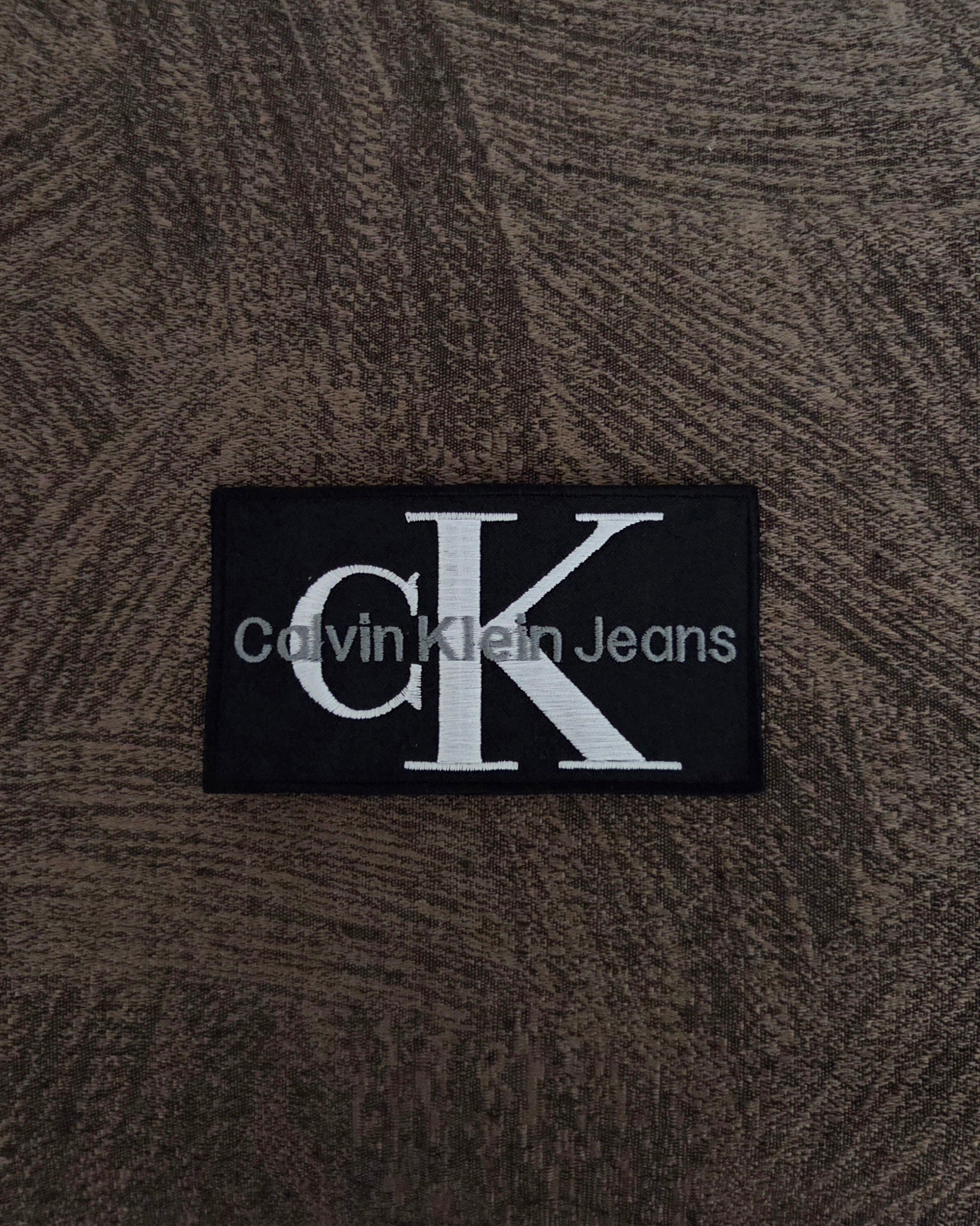 Patch Toppa Replica Calvin Klein Jeans 11x6.5cm Ricamata Termoadesiva e da Cucire