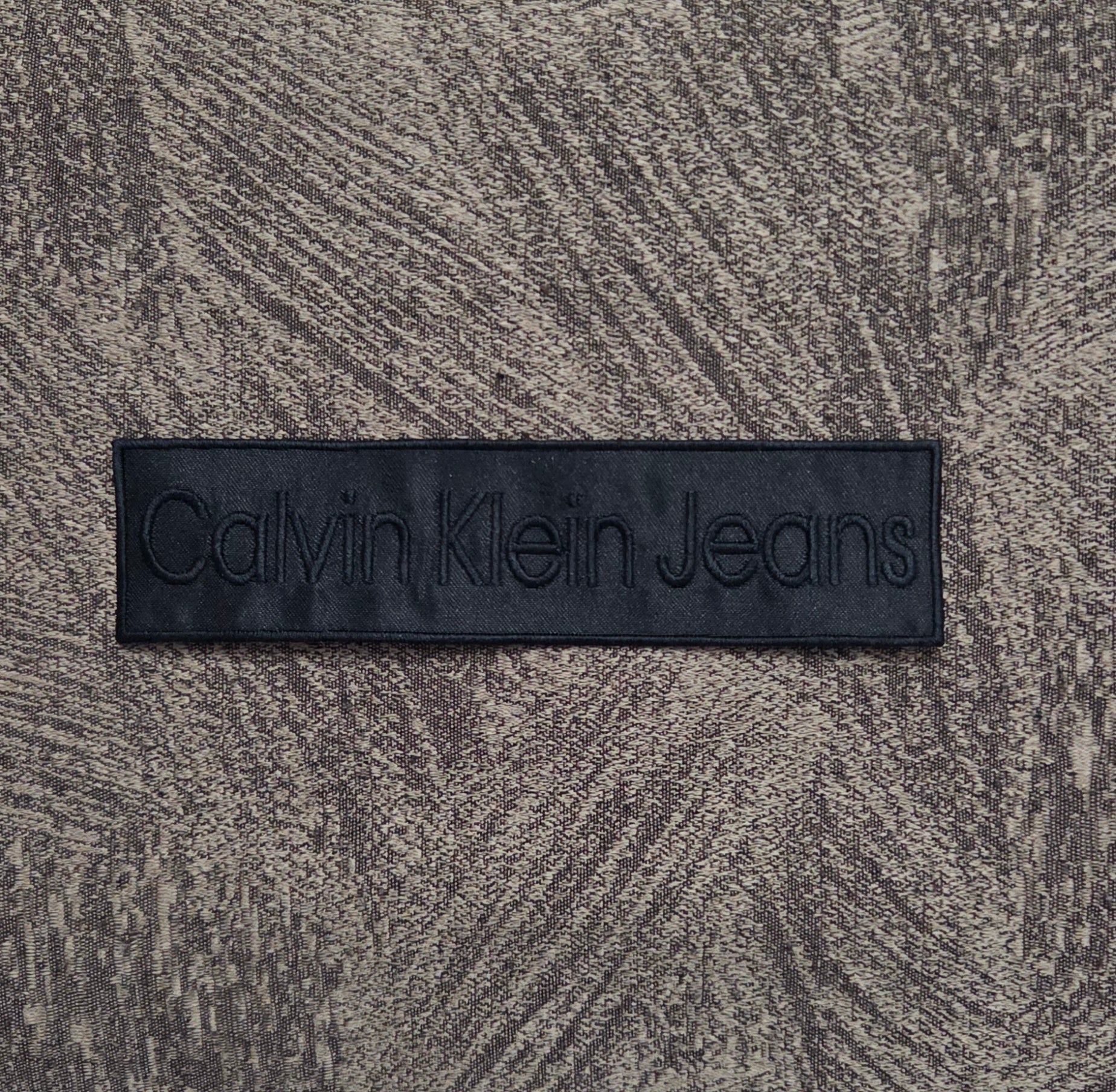 Patch Toppa Replica Calvin Klein Jeans 16x4cm Ricamata Termoadesiva e da Cucire